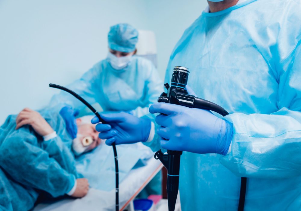 Endoscopy at the hospital. Doctor holding endoscope before gastroscopy. Medical examination